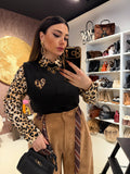 Gilet con cuore maculato i bottoni laterali