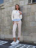 Maglione panna con trecce