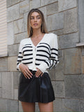 Maglione a righe spalline in strass
