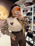 Gilet con cuore maculato i bottoni laterali