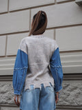 Maglione over con dettaglio in jeans