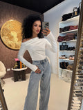 Blusa monospalla drappeggiata