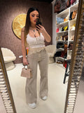 Jeans con bandana in pizzo e perle