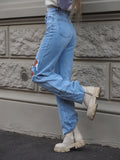 Jeans chiaro con strappi