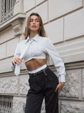Pantalone nero con dettaglio bianco