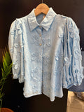 Camicia con fiori ricamati