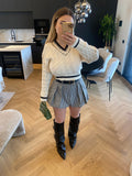Maglione bianco e nero con strass