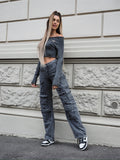 Maglione grigio con scollo a barchetta