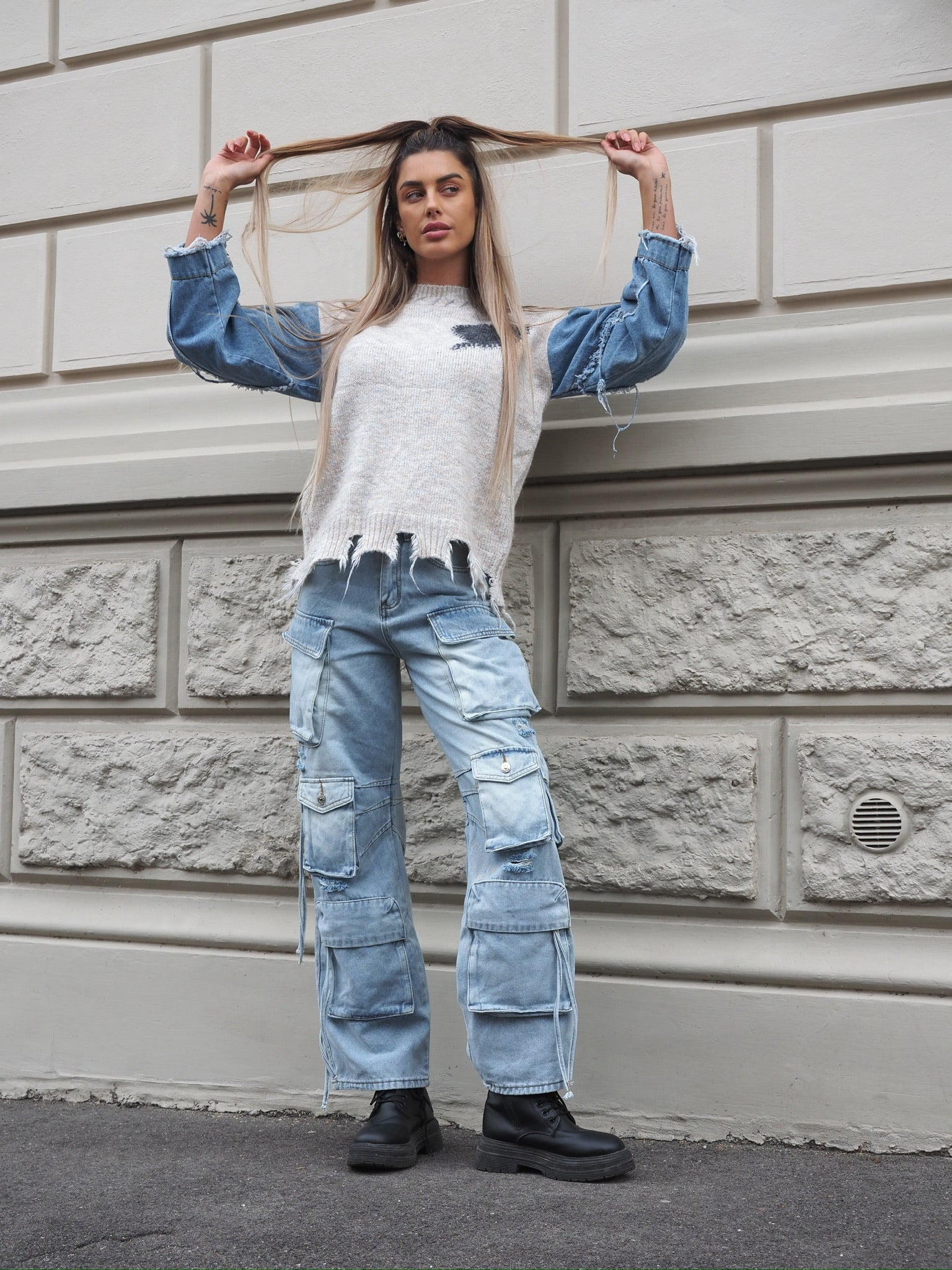 Maglione over con dettaglio in jeans