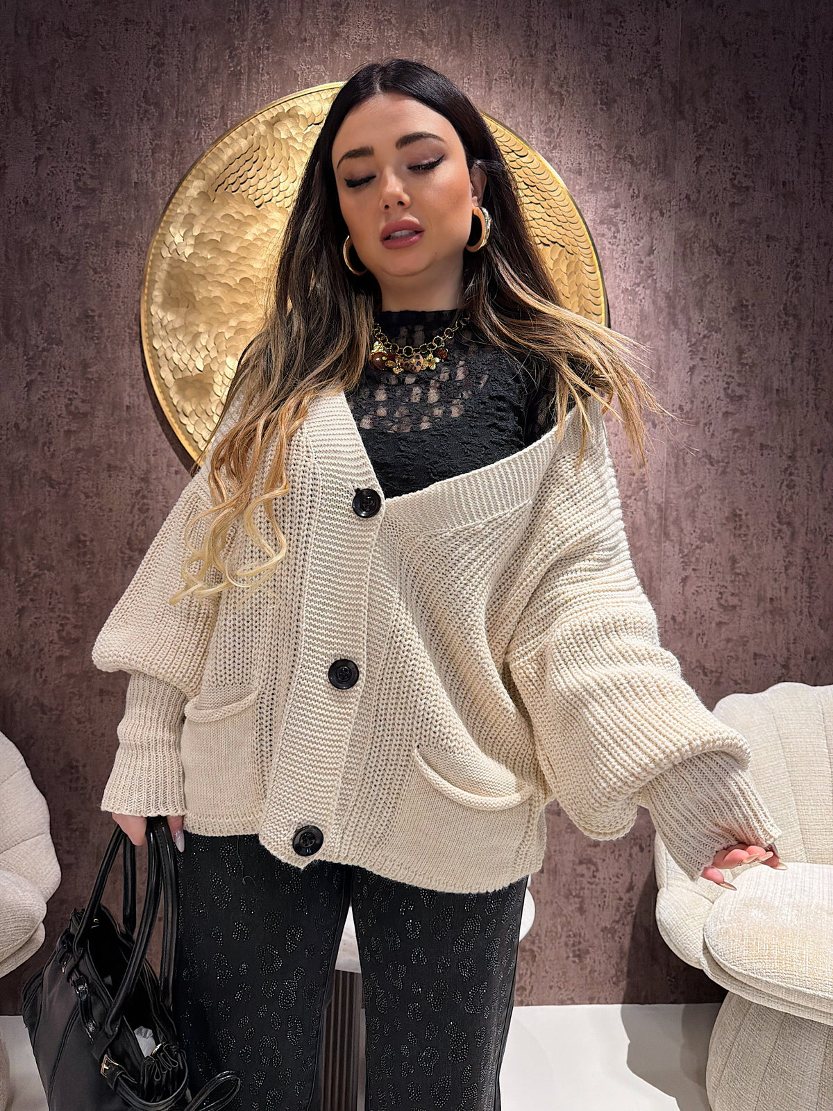 Cardigan in maglia con polsino