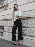 Pantalone nero con dettaglio bianco