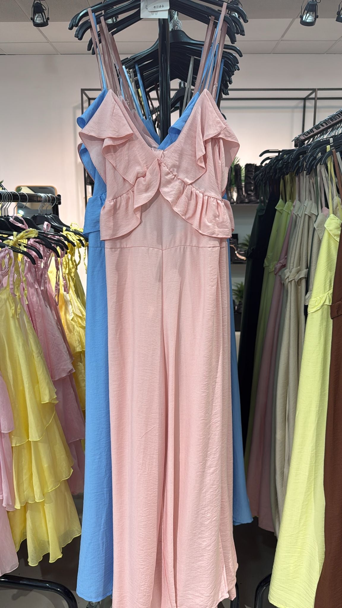 Tuta rosa con rouches