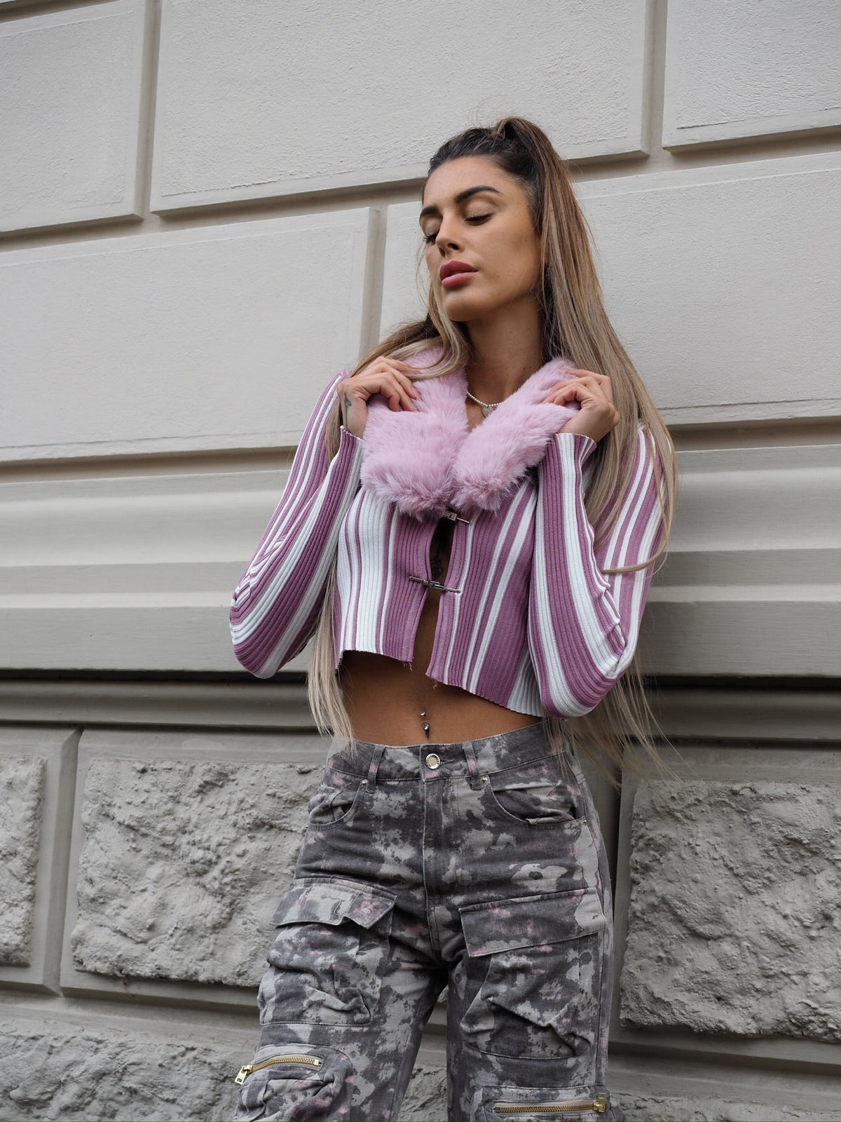 Maglione con pelliccia rosa