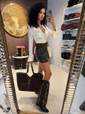 Body con bottoni oro e manica voilant