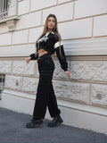 Pantalone cargo nero cuciture bianche