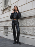 Pantalone in ecopelle con zip