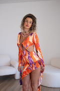 Abito asimmetrico arancio viola