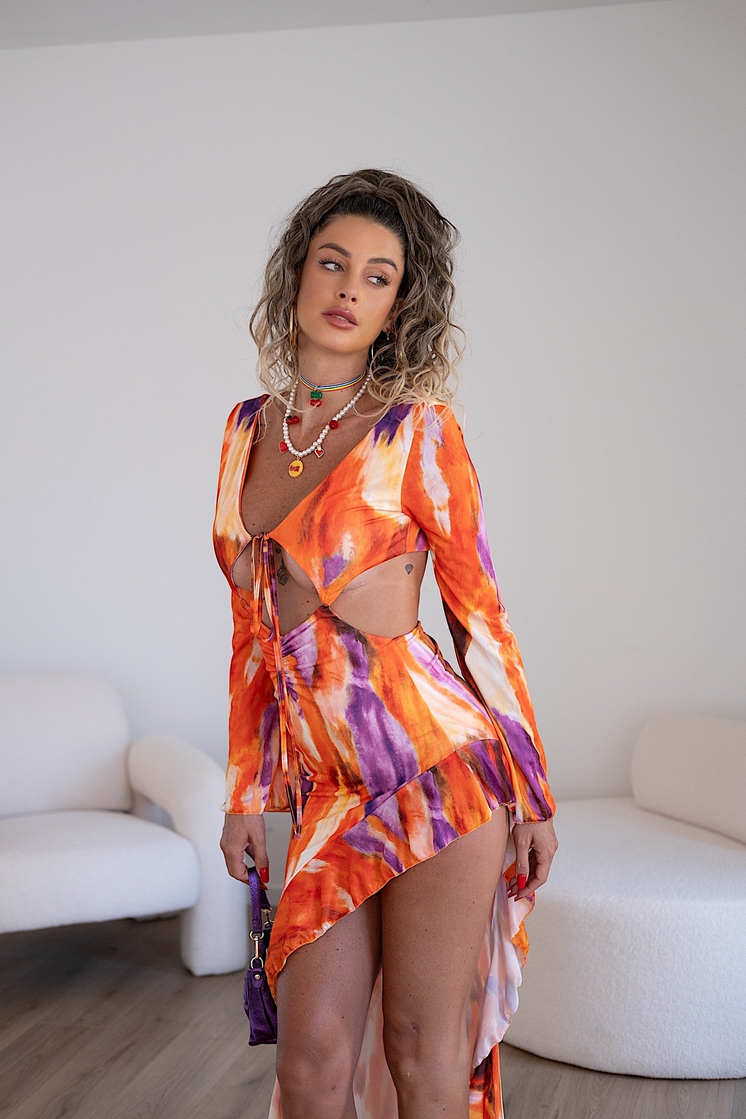 Abito asimmetrico arancio viola