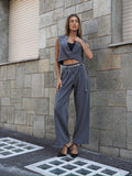 Completo smanicato e pantalone grigio