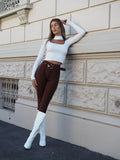 Pantalone choco con cintura oro