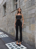 Pantaloni a vita alta con bottoni