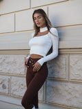 Pantalone choco con cintura oro