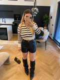 Maglione a righe con zip