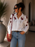 Camicia ricamata floreale Elegance