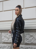 Giacca di ecopelle con fibbie