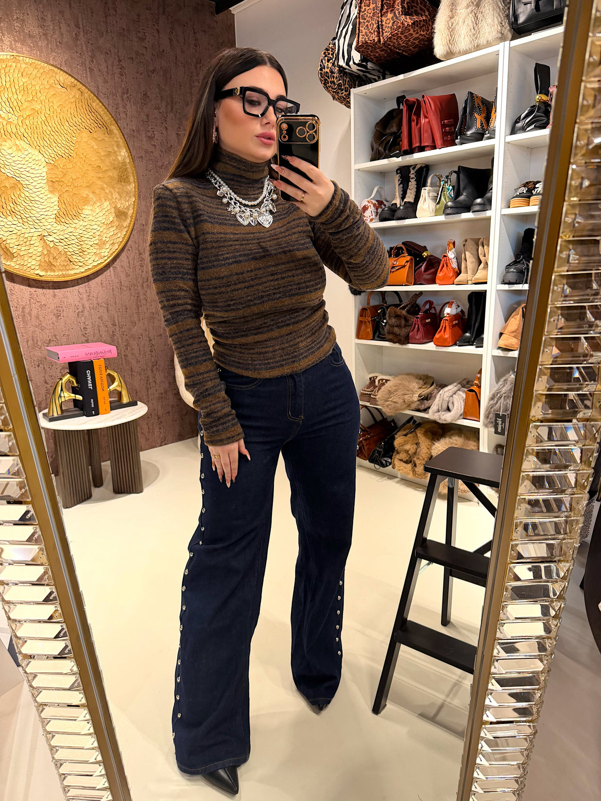 Maglioncino collo alto a righe spalle bombate