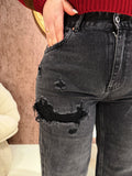 Jeans Vintage Touch nero con strappi