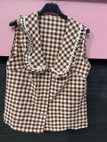 Top a quadri con scollo