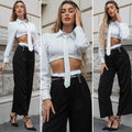Pantalone nero con dettaglio bianco