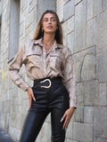 Pantalone in ecopelle con cintura