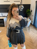 Maglione grigio con maxi paillettes