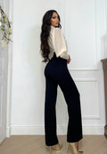 Tuta beige nero con cintura
