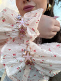 Bracciale con stelle rosa