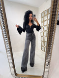Jeans scuro con strass e risvolto