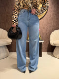 Jeans con tasca glitter maculata