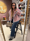 Giacca in ecopelliccia e jeans