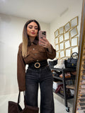 Jeans con risvolto e strass