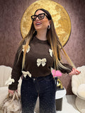 Maglione con fiocchi