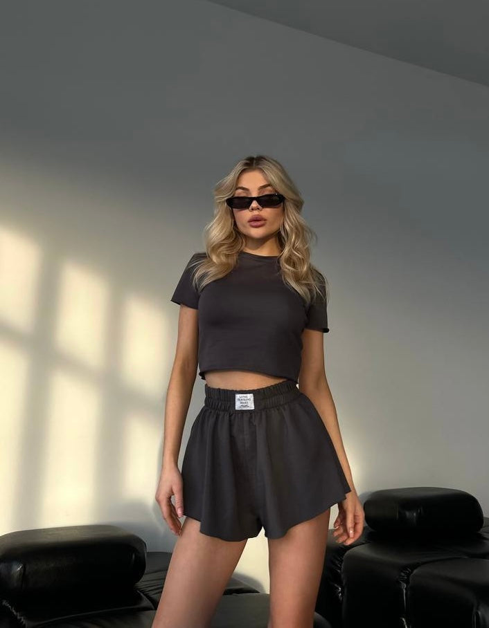 Set due pezzi maglia e short nero