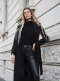 Maglione nero collo alto