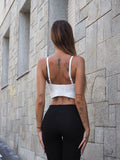 Top bianco con strass argento
