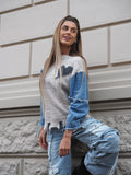 Maglione over con dettaglio in jeans