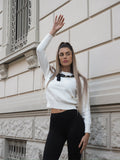 Maglione panna con fiocco nero