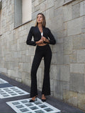 Pantalone nero a zampa