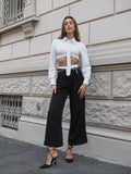 Pantalone nero con dettaglio bianco