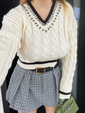 Maglione bianco e nero con strass